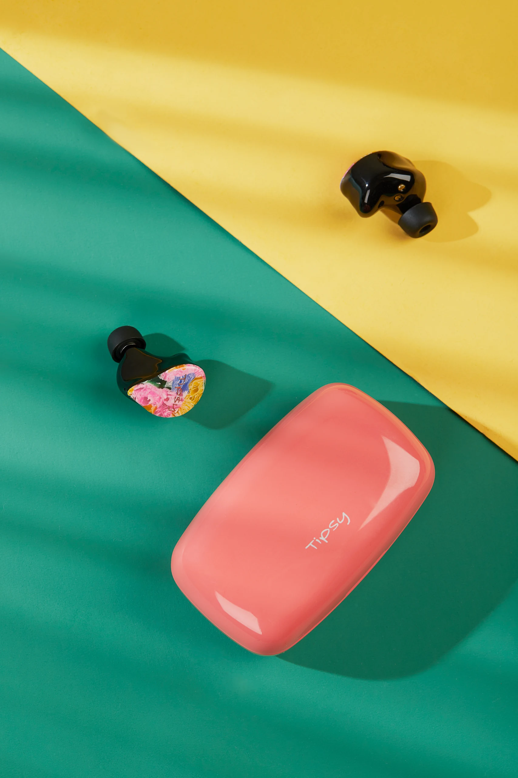 Wireless Earbuds in Colorful Still Life